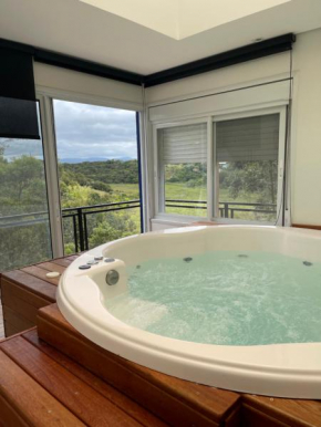 Rota 11:11 - Casa na Praia Rosa com piscina e jacuzzi aquecida